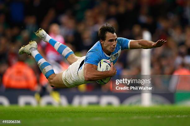Juan Imhoff of Argentina dives over the line to score his team's fourth try during the 2015 Rugby World Cup Quarter Final match between Ireland and...