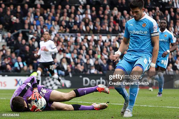 Wolverhampton Wanderers FC goal keeper, Emiliano Martinez saves a goal from Derby County FC during the Sky Bet Championship match between Derby...