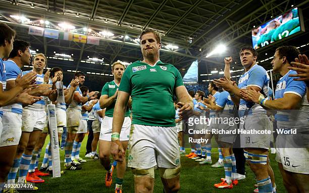 Ireland captain Jamie Heaslip leads his team off after losing the 2015 Rugby World Cup Quarter Final match between Ireland and Argentina at...