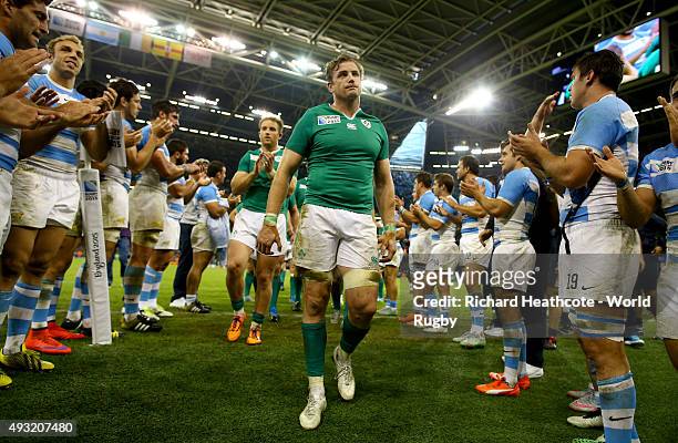 Ireland captain Jamie Heaslip leads his team off after losing the 2015 Rugby World Cup Quarter Final match between Ireland and Argentina at...