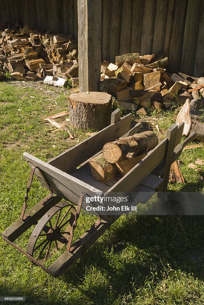 Woodshed and wheelbarrow