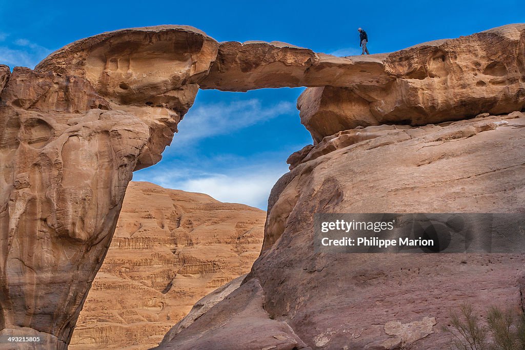 Natural rock arch bridge in Wadi Rum, Jordan