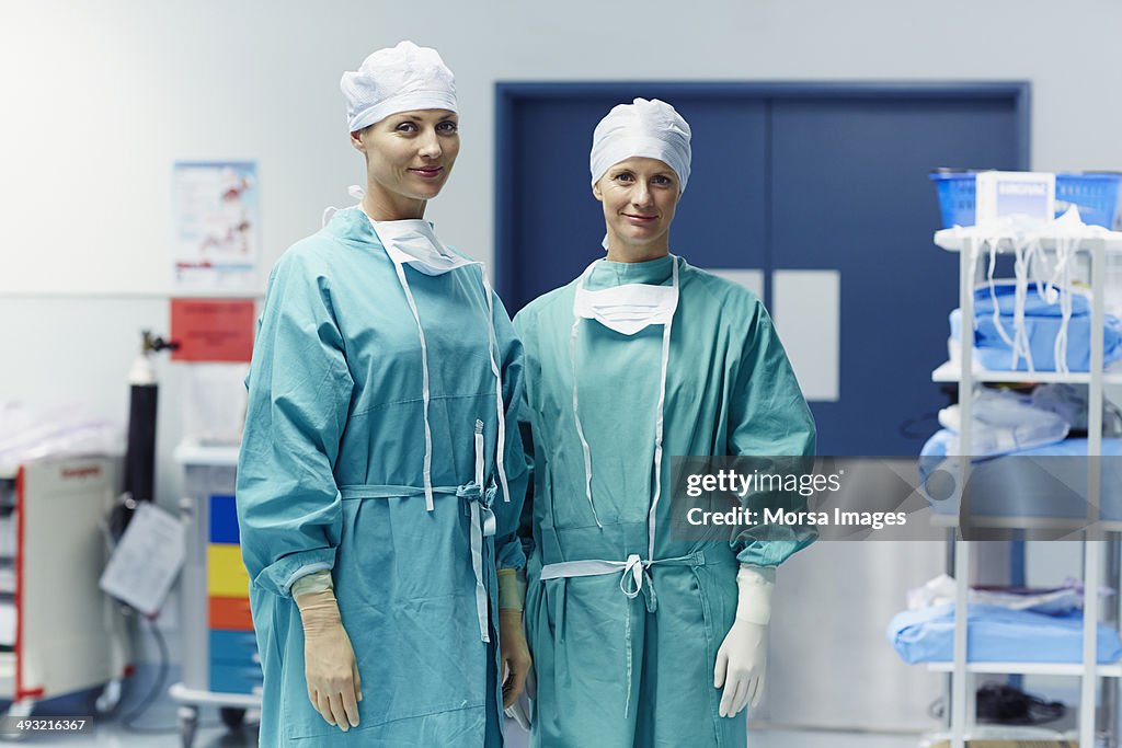 Confident female surgeons in operating room
