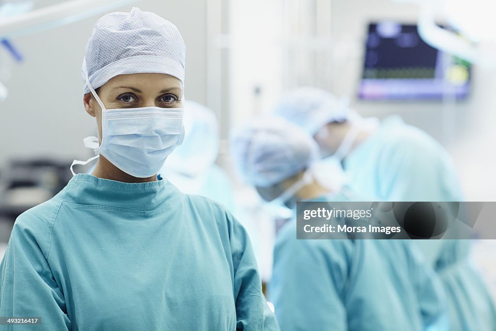 Portrait of confident female surgeon