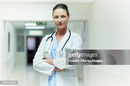 Confident doctor standing arms crossed Confident doctor standing arms crossed