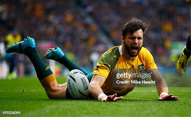 Adam Ashley-Cooper of Australia celebrates scoring his teams opening try during the 2015 Rugby World Cup Quarter Final match between Australia and...