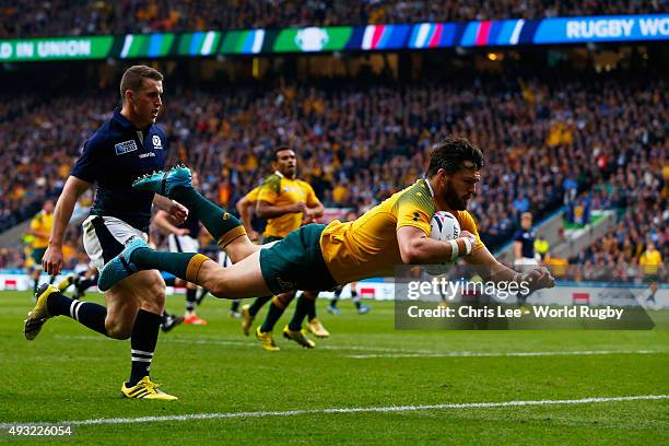 Adam Ashley-Cooper of Australia scores his teams opening try during the 2015 Rugby World Cup Quarter Final match between Australia and Scotland at...