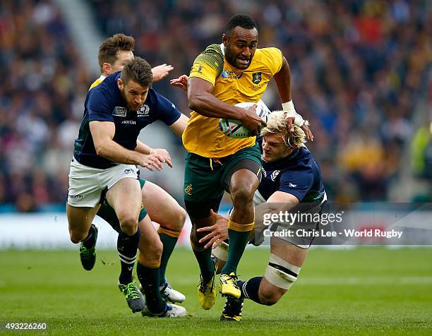 Tevita Kuridrani of Australia breaks past Richie Gray of Scotland during the 2015 Rugby World Cup Quarter Final match between Australia and Scotland...