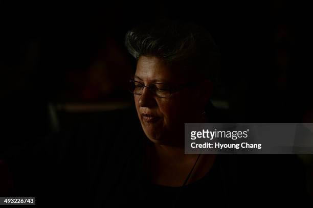 Gloria Sanchez share the memory of her nephew Cristobal James Flores with family members. Lakewood, Colorado. May 22. 2014. Identification of remains...