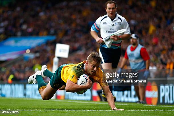 Drew Mitchell of Australia scores his teams second try during the 2015 Rugby World Cup Quarter Final match between Australia and Scotland at...
