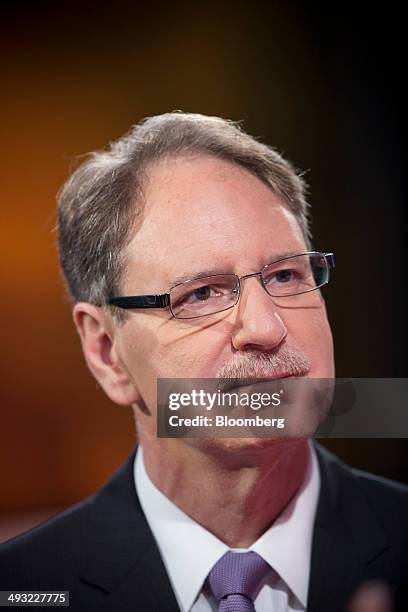 Johan De Nysschen, president of Infiniti at Nissan Motor Co., listens during a Bloomberg Television interview in Hong Kong, China, on Friday, May 23,...