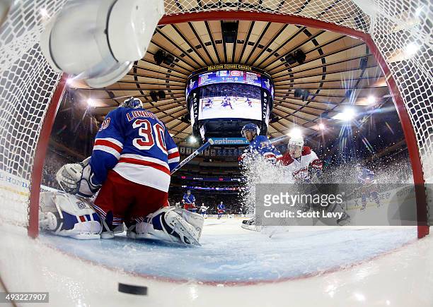 Brendan Gallagher of the Montreal Canadiens and Ryan McDonagh of the New York Rangers battle for position as Henrik Lundqvist of the New York Rangers...