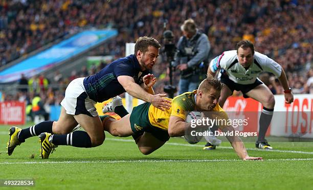 Drew Mitchell of Australia scores his teams fourth try during the 2015 Rugby World Cup Quarter Final match between Australia and Scotland at...
