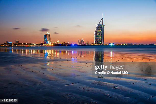 sunset in burj al arab - jumeirah beach stock pictures, royalty-free photos & images