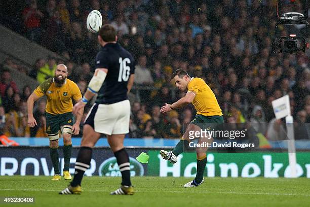 Bernard Foley of Australia kicks the match winning penalty during the 2015 Rugby World Cup Quarter Final match between Australia and Scotland at...