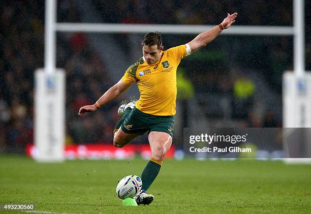 Bernard Foley of Australia kicks the match winning penalty during the 2015 Rugby World Cup Quarter Final match between Australia and Scotland at...