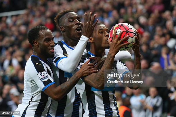 Georginio Wijnaldum of Newcastle United celebrates as he scores their sixth goal and his fourth with Vurnon Anita and Massadio Haidara during the...