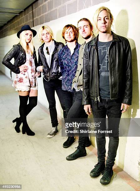 Ross Lynch, Riker Lynch, Rocky Lynch, Rydel Lynch and Ellington Ratliff of R5 pose backstage before meeting fans and signing copies of their new...