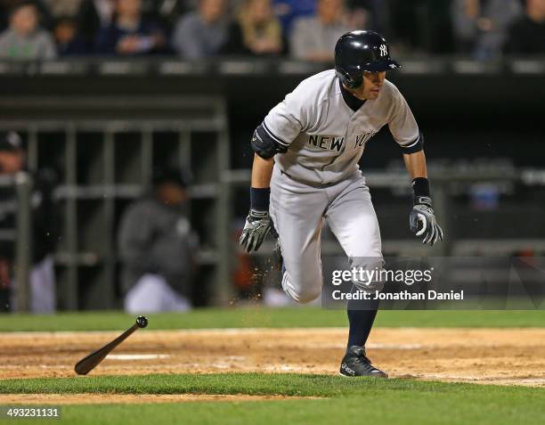 Ichiro Suzuki of the New York Yankees runs after hitting a pinch-hit single in the 9th inning against the Chicago White Sox at U.S. Cellular Field on...