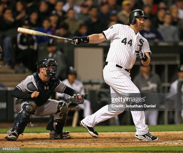 Adam Dunn of the Chicago White Sox hits a run-scoring single in the 8th inning against the New York Yankees at U.S. Cellular Field on May 22, 2014 in...