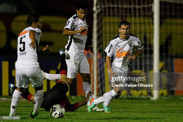 Players of Atletico-MG in action during the match between Vitoria and Atletico-MG as part of Brasileirao Series A 2014 at Alberto Oliveira Stadium on...