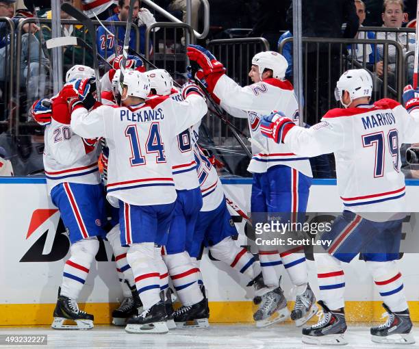 Members of the Montreal Canadiens celebrate the game winning goal by Alex Galchenyuk in the overtime period of Game Three of the Eastern Conference...