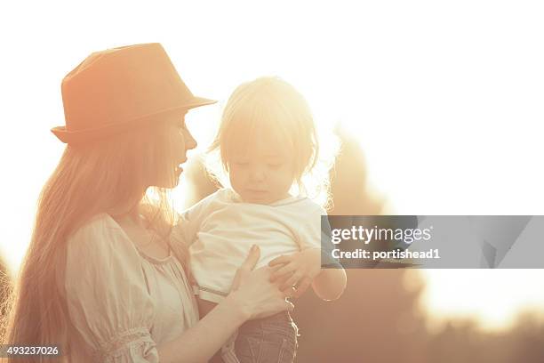 sunset joy - bowler hats stock pictures, royalty-free photos & images