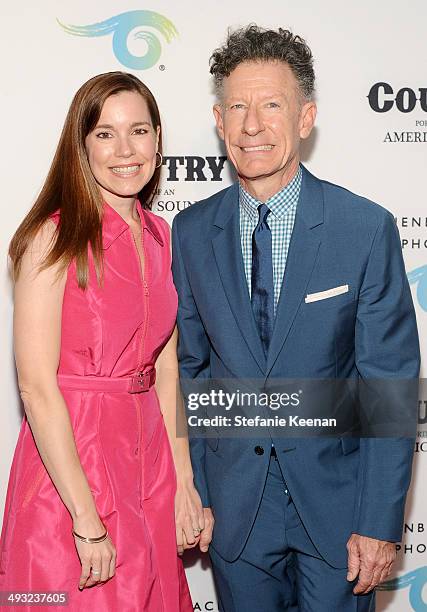 Musician Lyle Lovett and April Kimble attend the Annenberg Space for Photography Opening Celebration for "Country, Portraits of an American Sound" at...