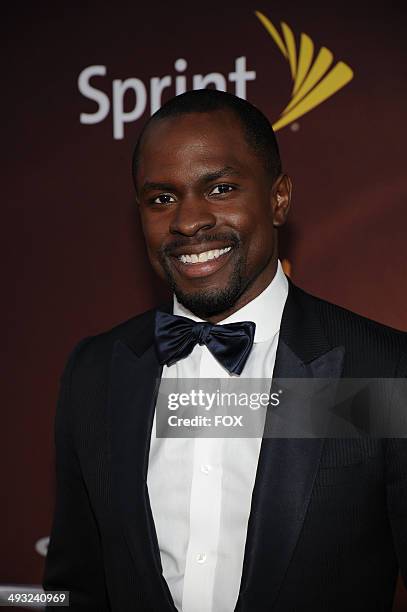 Cast member Gbenga Akinnagbe arrives on the red carpet for theworld premiere, sponsored by Sprintand the Chrysler brand, on Friday, May 2, 2014...