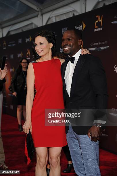 Cast members Mary Lynn Rajskub and Gbenga Akinnagbe arrive on the red carpet for theworld premiere, sponsored by Sprintand the Chrysler brand, on...
