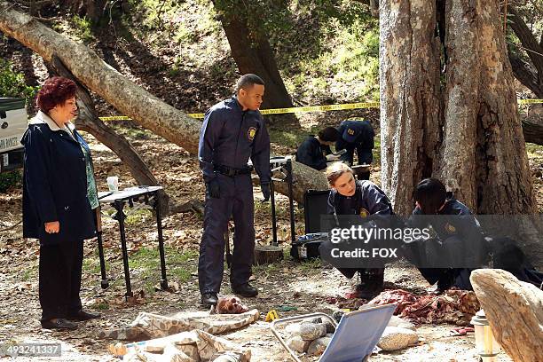 Patricia Belcher, Eugene Byrd, Emily Deschanel and Tamara Taylor in the "The Nail in the Coffin" episode of BONES airing Monday, April 21, 2014 on...