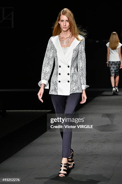 Model walks the runway during the Tae Ashida Ready to Wear show as part of Mercedes Benz Fashion Week TOKYO 2016 S/S on October 16, 2015 in Tokyo,...