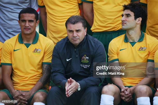 Tim Cahill, Socceroos Head Coach Ange Postecoglou and Socceroos captain Mike Jedinak line up for the team photo during an Australian Socceroos...