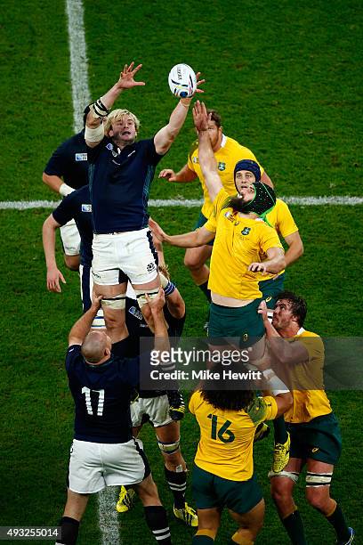 Richie Gray of Scotland jumps for a lineout ball with Scott Fardy of Australia during the 2015 Rugby World Cup Quarter Final match between Australia...