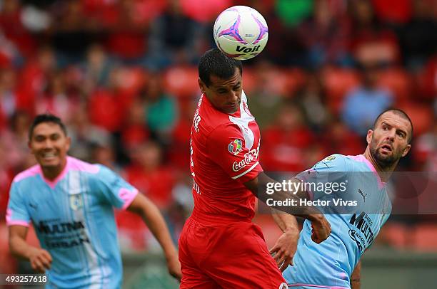 Paulo Da Silva of Toluca heads the ball during the 13th round match between Toluca and Queretaro as part of the Apertura 2015 Liga MX at Nemesio Diez...