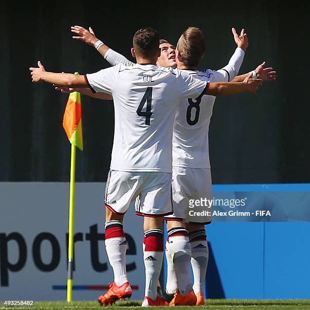 Felix Passlack of Germany celebrates his team's first goal with team mates Goekhan Guel and Niklas Dorsch during the FIFA U-17 World Cup Chile 2015...