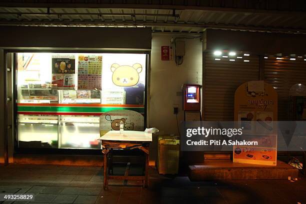 Twenty four hours a day convenience store closes after a curfew started at 10pm on May 22, 2014 in Bangkok. Thai soldiers began clearing the sites of...