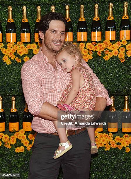 Actor Oliver Hudson and his daughter Rio Hudson arrive at the Sixth-Annual Veuve Clicquot Polo Classic, Los Angeles at Will Rogers State Historic...