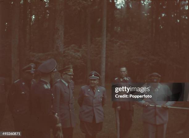 German Chancellor Adolf Hitler pictured with various Generals and high ranking officials including Hermann Goering on far right and Martin Bormann...
