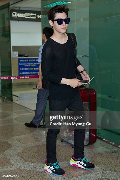 Henry of South Korean boy band Super Junior M is seen on departure at Gimpo International Airport on May 22, 2014 in Seoul, South Korea.