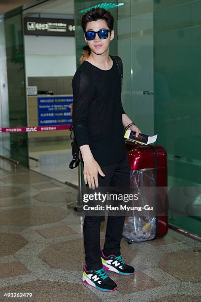 Henry of South Korean boy band Super Junior M is seen on departure at Gimpo International Airport on May 22, 2014 in Seoul, South Korea.