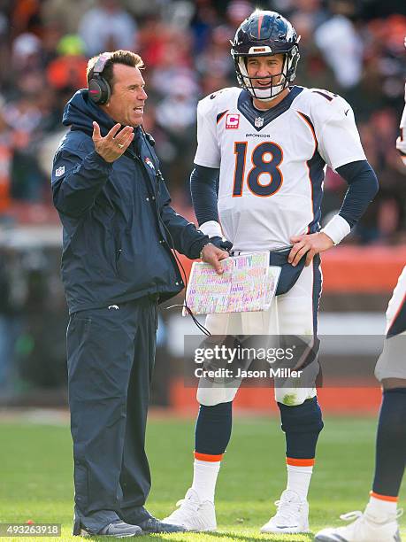 Head coach Gary Kubiak as quarterback Peyton Manning of the Denver Broncos listens during during overtime against the Cleveland Browns at FirstEnergy...