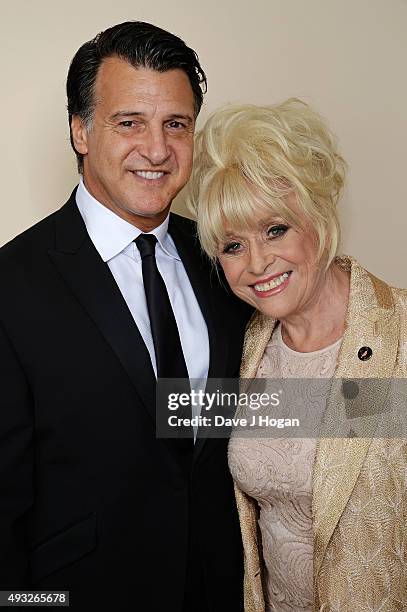 Barbara Windsor and Scott Mitchell attend the Amy Winehouse Foundation Gala at The Savoy Hotel on October 15, 2015 in London, England.