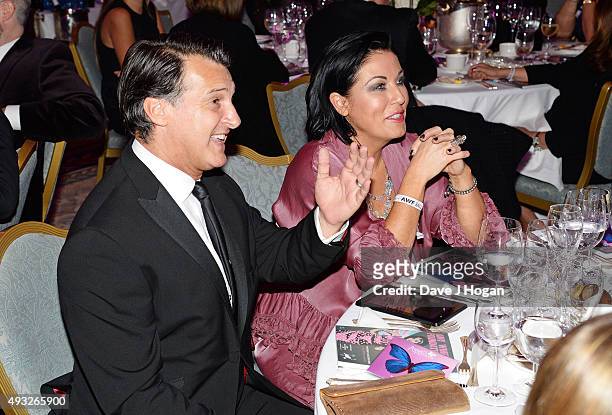 Jessie Wallace and Scott Mitchell attend the Amy Winehouse Foundation Gala at The Savoy Hotel on October 15, 2015 in London, England.