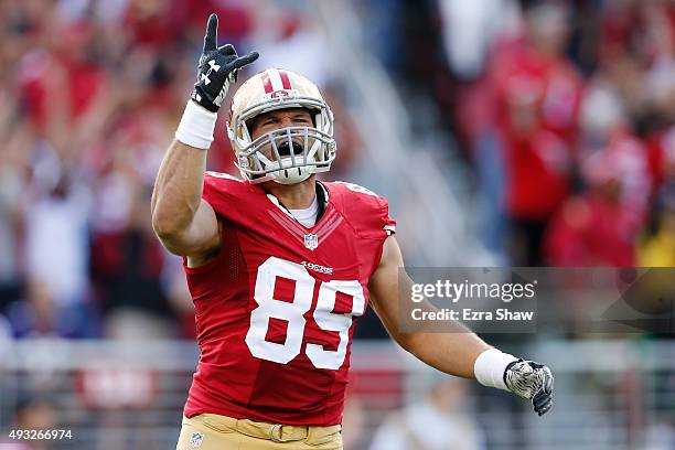 Tight end Vance McDonald of the San Francisco 49ers reacts after a touchdown by wide receiver Torrey Smith during their NFL game against the...