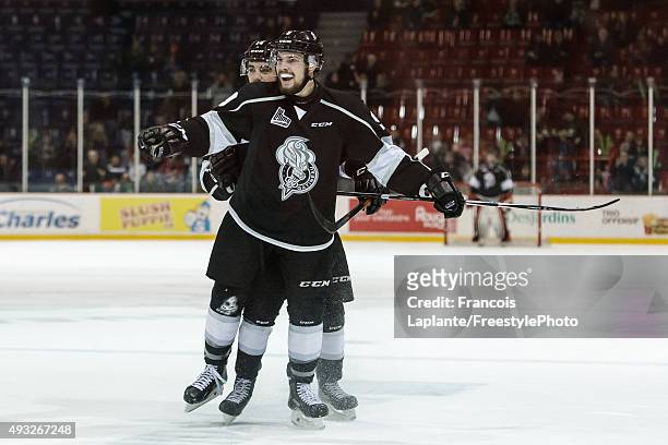 Yan Pavel Laplante of the Gatineau Olympiques celebrates his second period goal against the Saint John Sea Dogs on October 18, 2015 at Robert Guertin...