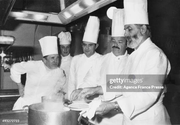 French chef Paul Bocuse in the kitchens of the Elysee Palace, Paris, after being awarded the Legion of Honour by President Valery Giscard d'Estaing,...