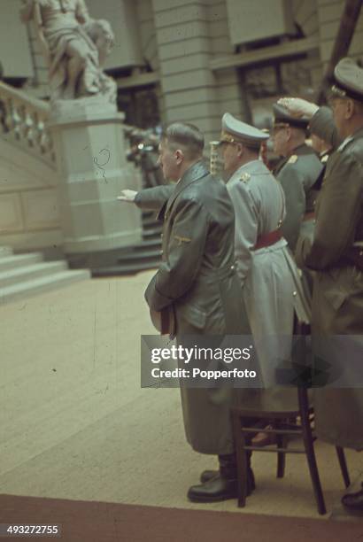 German Chancellor Adolf Hitler salutes an audience of high ranking military figures during a speech in Potsdam, Germany circa 1940. Aviation Minister...