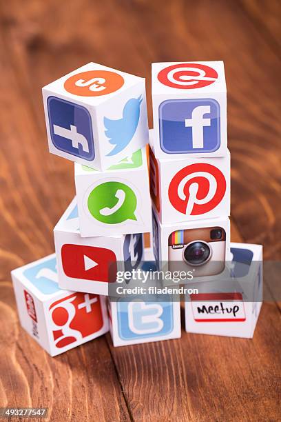 social media cubes on a wooden background - google social networking service stock pictures, royalty-free photos & images