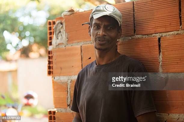 brazilian construction worker - mason bricklayer stock pictures, royalty-free photos & images